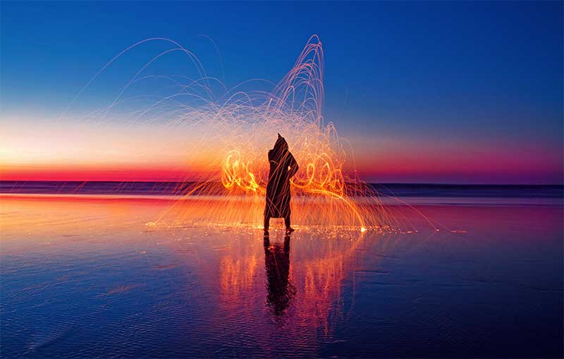 man with swirling lights