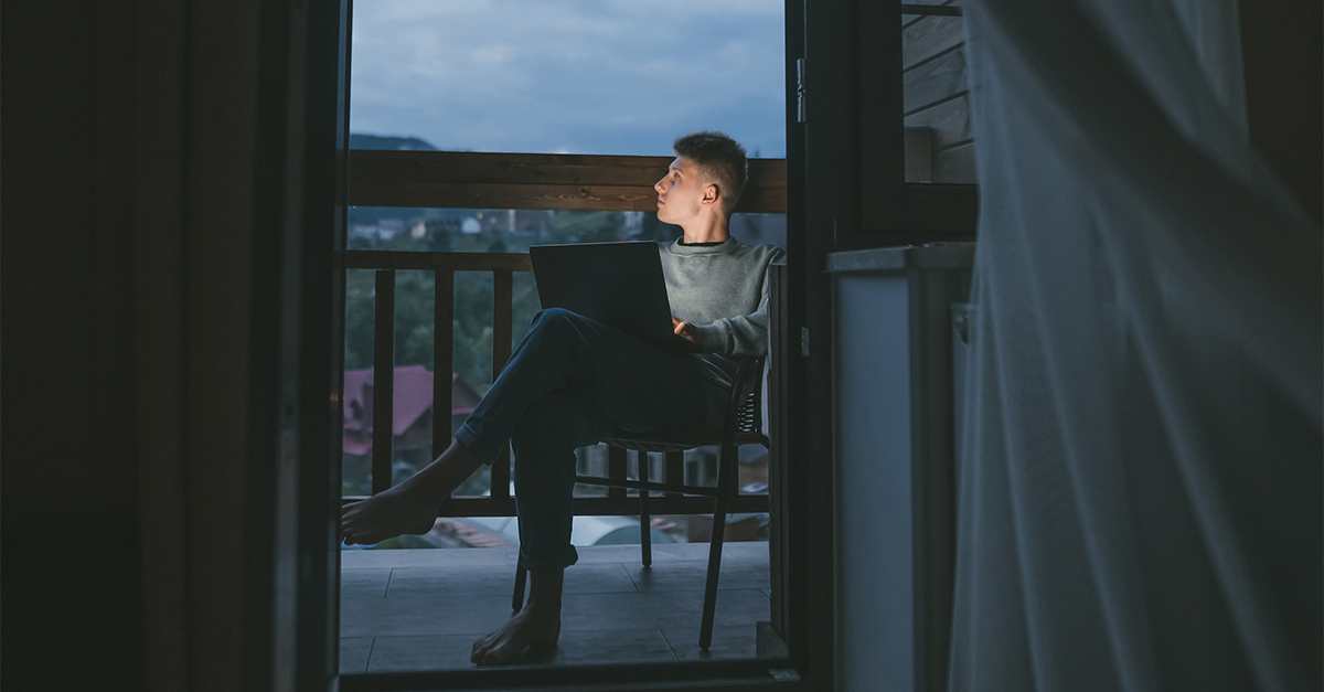 man on balcony