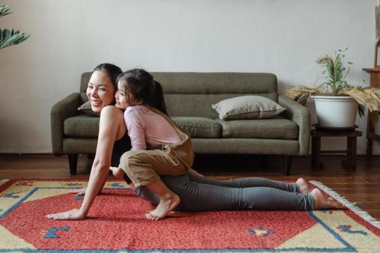 mom and daughter playing