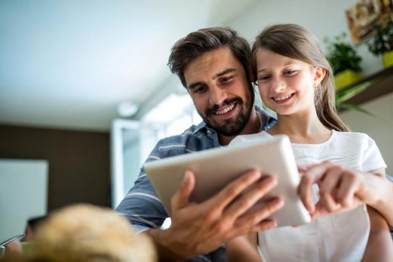 family using laptop