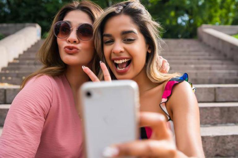women taking selfie